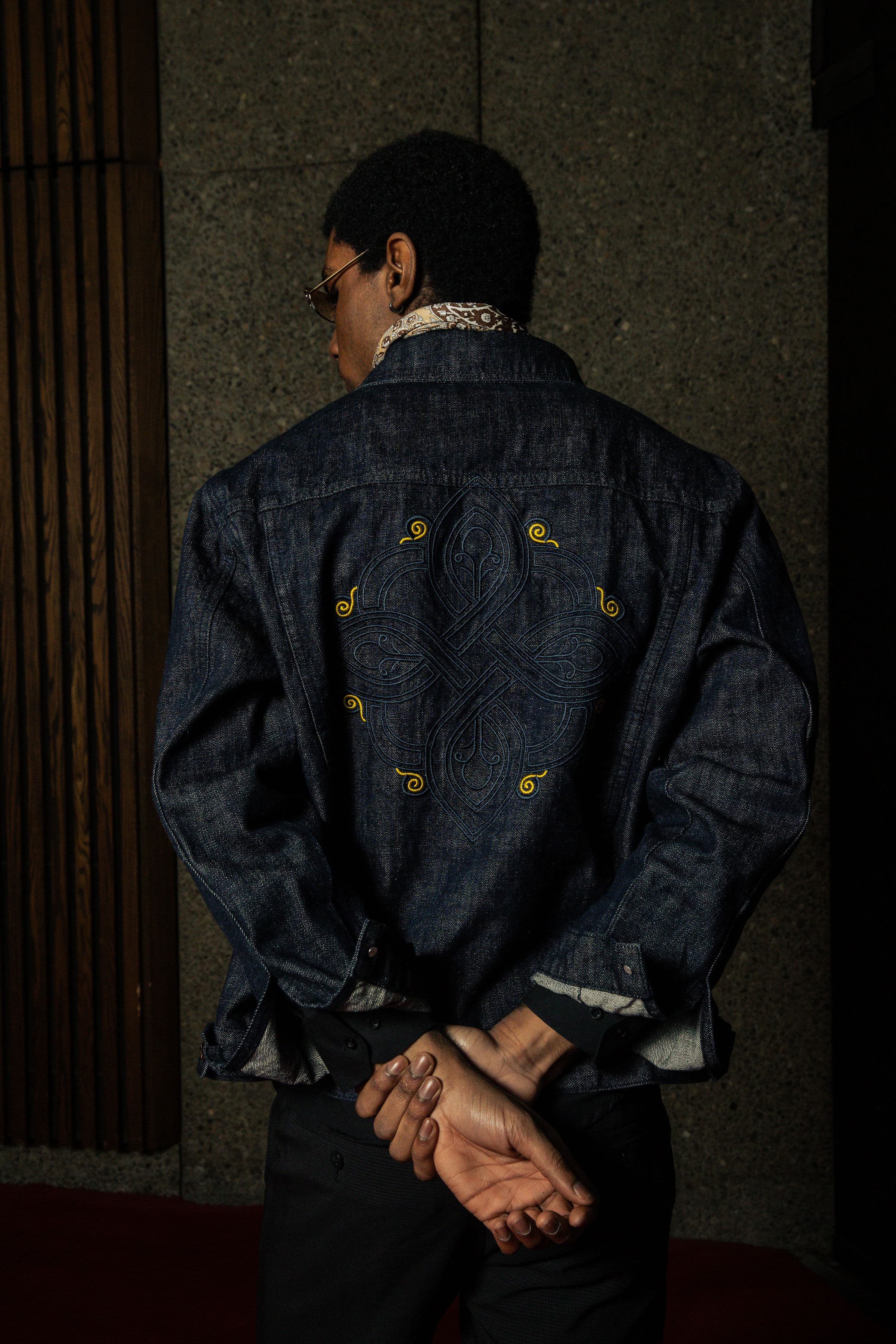 Voce D'Oro lookbook portrait with a minimal studio backdrop